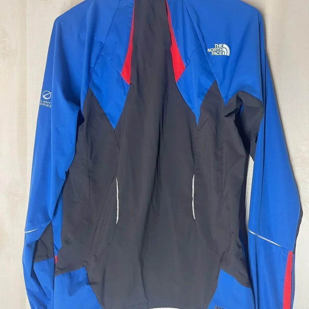 The North Face flight series blue black red jacket, size small‎
